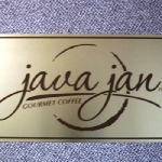 Brushed aluminum logo signage