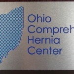 Brushed Aluminum with cut logo and lettering Brushed Aluminum with cut logo and lettering