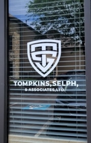 Tompkins Window Lettering